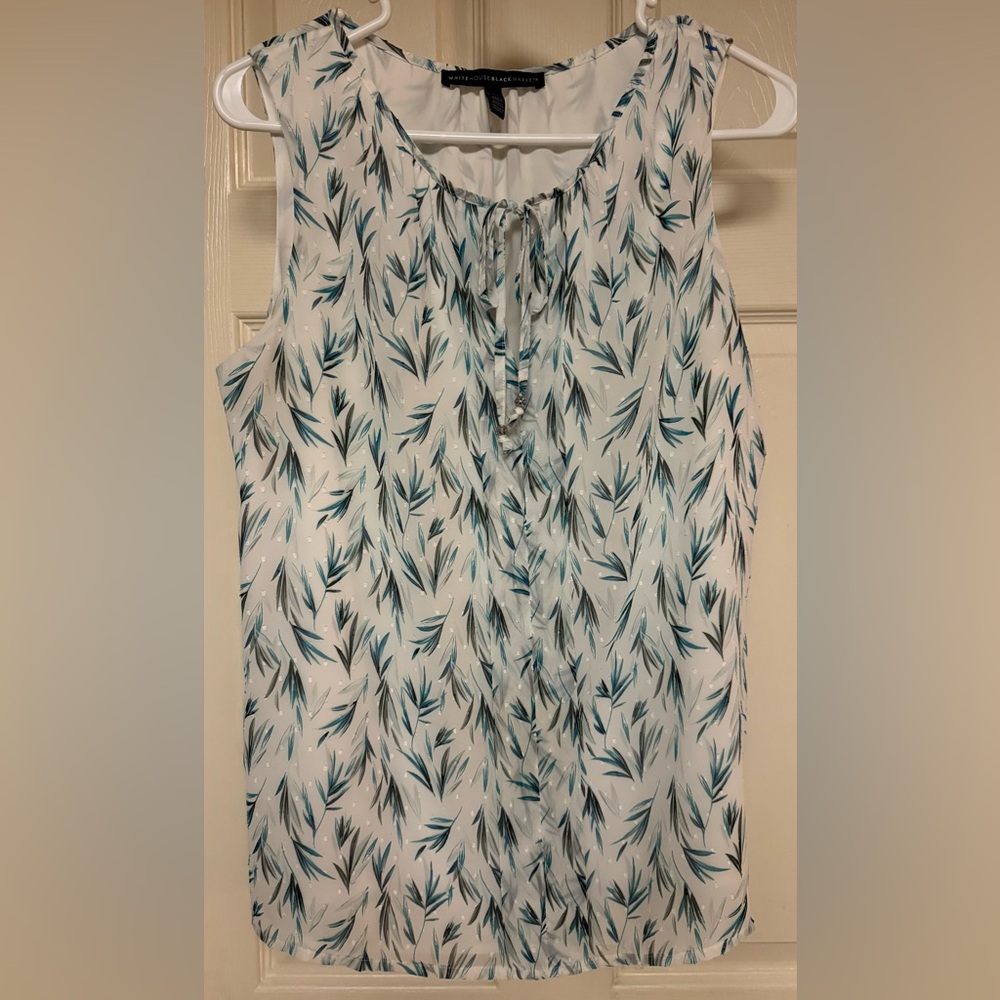 Women’s size 10 sleeveless blouse. White House / Black Market.